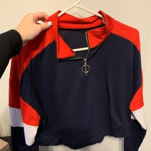 A blue/red/white Cropped Longsleeve